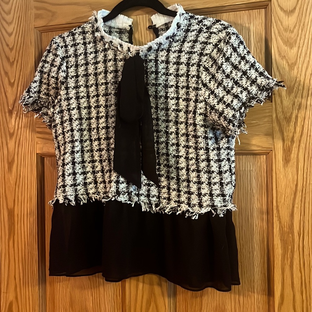 Plaid top with a bow